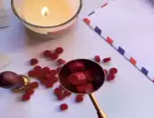 شمع لون احمر 