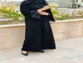 عبايه مميزه بأزرار  على طولها وخياطه في الاكمام والشيله 